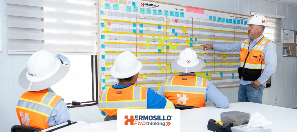 Lean Construction workers having a meeting.