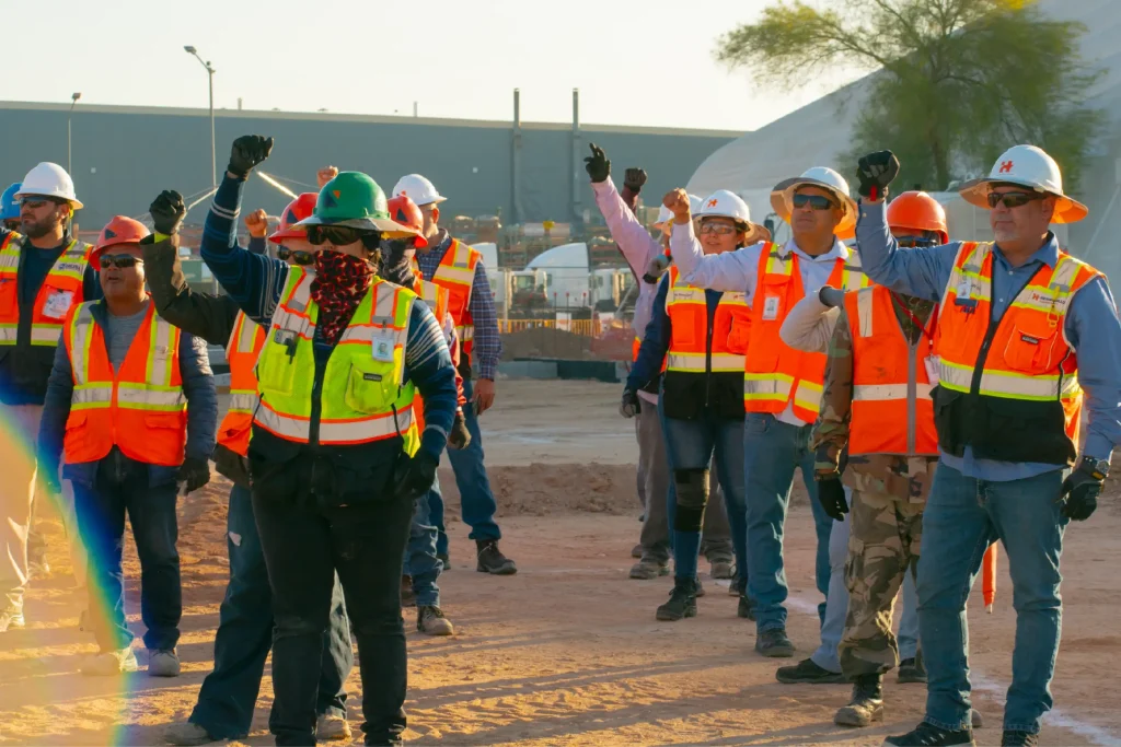 Group of workers before the start of the workday